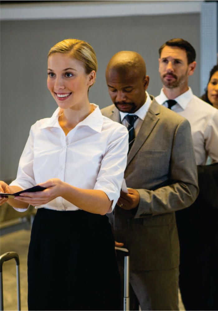 People on a queue in an airport setting